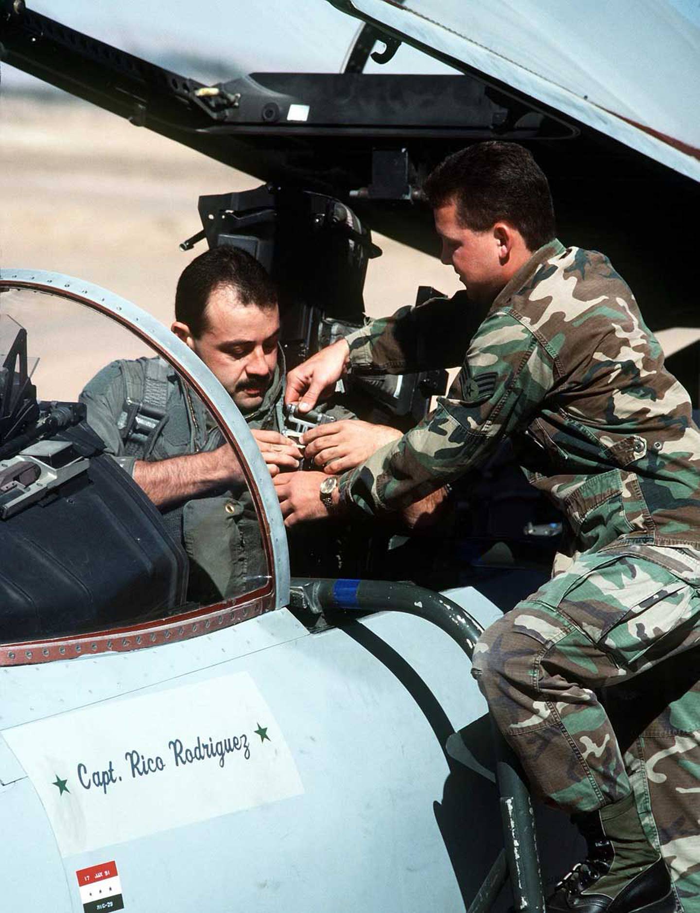 Cesar “Rico” Rodriguez straps into his F-15 Thunderbird before a mission during Operation Desert Storm.