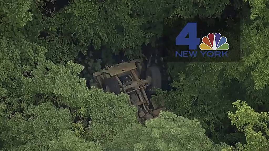 a light medium tactical vehicle sits overturned near the Camp Natural Bridge summer military training camp off Route 293, Thursday, June 6, 2019 in Cornwall, N.Y.