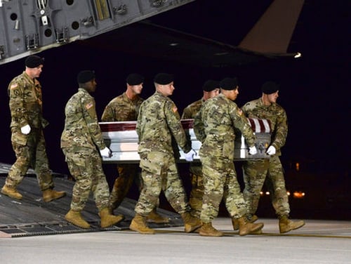 An Army carry team transfers the remains of Staff Sgt. Dustin Wright on Oct. 5, 2017, upon arrival at Dover Air Force Base, Del. Wright was one of four U.S. troops and four Nigerien forces killed in an ambush in Niger earlier this month. (Staff Sgt. Aaron J. Jenne/Air Force)