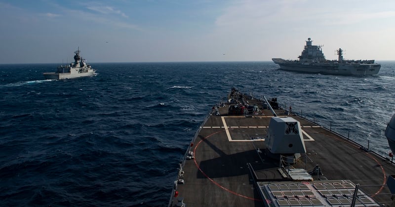 The guided-missile destroyer Sterett, Royal Australian Navy frigate Ballarat, left, and the Indian Navy aircraft carrier Vikramaditya steam in formation in the North Arabian Sea during Malabar 2020 Nov. 17. The Nimitz Carrier Strike Group is currently deployed to the 7th Fleet area of operations in support of a free and open Indo-Pacific. (MCSN Drace Wilson/Navy)
