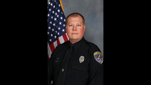 This undated photo provided by the Auburn Police Department shows Officer William Buechner, who was killed while responding to a domestic disturbance report on Sunday, May 19, 2019. (Auburn Police Department via AP)