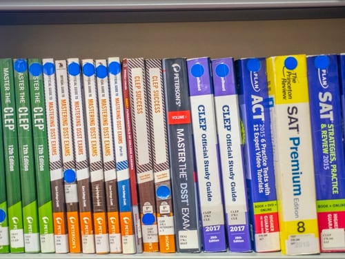 Test preparation books sit on the shelf at the base library at RAF Mildenhall, England, in October 2019. (Airman 1st Class Joseph Barron/Air Force)