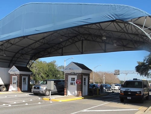 The entrance to Naval Air Station Pensacola in Florida is shown in January 2016. Three people were killed and eight others injured when a Saudi national training at the base opened fire on a classroom on Dec. 6. (AP Photo/Melissa Nelson)