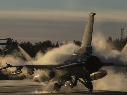 A U.S. Air Force F-16 Fighting Falcon assigned to the 480th Expeditionary Fighter Squadron is de-iced at Kallax Air Base, Sweden, Oct 24, 2018, in preparation for Trident Juncture 2018, which began Thursday, Oct. 25, 2018. (1st Lt. Casey Rodriguez/Air Force)