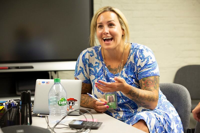 Shannon Sartin, executive director of digital services for the Department of Health and Human Services, talks during a meeting at the U.S. Digital Service office. (Alan Lessig/Staff)