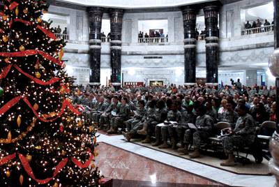 Victory Base Complex personnel attend the Christmas Eve Candlelight Service at Al Faw Palace, Camp Victory, Baghdad, Iraq, on Dec. 24, 2008.