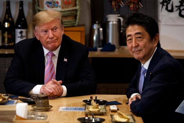 President Donald Trump sits at dinner with Japanese Prime Minister Shinzo Abe, Sunday, May 26, 2019, in Tokyo. (Evan Vucci/AP)