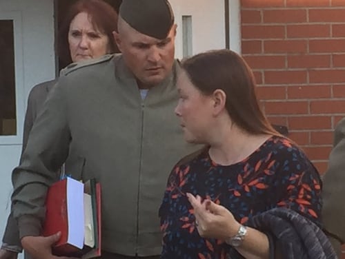 Gunnery Sgt. Joseph Felix and his wife exit a courthouse at Camp Lejeune, North Carolina on Nov. 1. (Jeff Schogol/Staff)