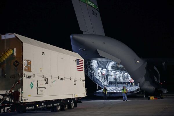 The new GPS III satellite (shown loaded in Space Vehicle 01 as it ships to Cape Canaveral for launch) will provide enhanced capability, as the United States is moving to use the military to secure assets in space. (Courtesy Lockheed Martin)