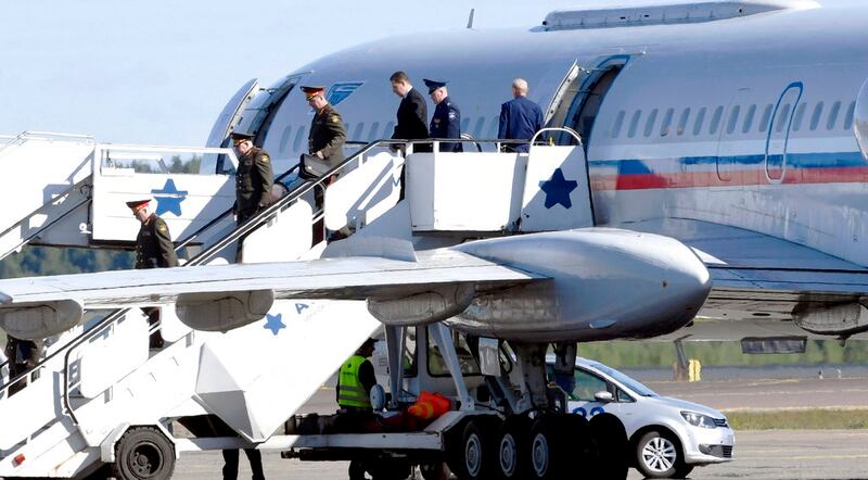 A Russian delegation arrives at the Helsinki-Vantaa Airport, in Finland, Friday, June 8, 2018. The Finnish Defense Forces says the Gen. Joseph Dunford, chairman of the U.S. Joint Chiefs of Staff, will meet his Russian counterpart in Helsinki to discuss 