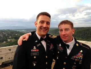Then-Army Capt. Jim Rudisill (left) poses with Sgt. 1st Class Adam McGuire during a 2013 wedding. Rudisill is now at the center of lawsuit against the Department of Veterans Affairs which could grant new GI Bill benefits to millions of veterans. (Photo courtesy of Jim Rudisill)