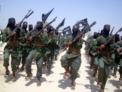 In this Feb. 17, 2011, file photo, hundreds of newly trained al-Shabab fighters perform military exercises in the Lafofe area some 18 km south of Mogadishu, in Somalia. (Farah Abdi Warsameh/AP)