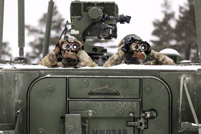 Soldiers from 1st Squadron, 2d Cavalry Regiment, enhanced Forward Presence Battle Group Poland, keep watch on targets  during a joint combat live fire of the Gepard Air Defense System Feb. 2, 2021, at Bemowo Piskie Training Area, Poland.