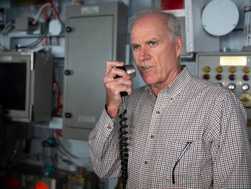 Then-Secretary of the Navy Richard V. Spencer addresses the crew of aircraft carrier Gerald R. Ford through the ship's 1MC during a visit at sea on Oct. 27. A scandal has forced him out as Secretary of the Navy. (Mass Communication Specialist Seaman Apprentice Angel Thuy Jaskuloski/Navy)
