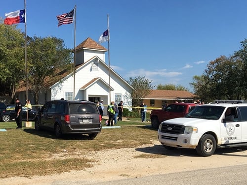 Emergency personnel respond to a fatal shooting at a Baptist church in Sutherland Springs, Texas, Sunday, Nov. 5, 2017. (KSAT via AP)