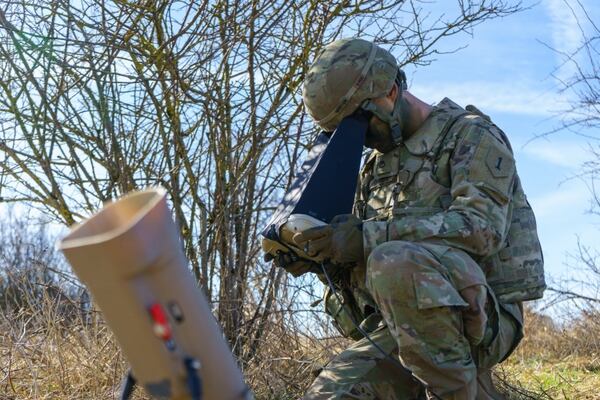 Pvt. 1st Class Brandon Norton, an M1 Abrams crewmember with 1st Battalion, 63rd Armor Regiment, 2nd Armored Brigade Combat Team, 1st Infantry Division, uses a remote-control optical device that provides soldiers with a first-person point of view as the Lethal Miniature Aerial Missile System. (Sgt. Gregory T. Summers/Army)