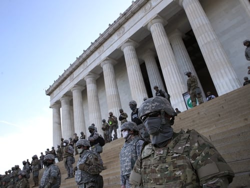 Members of the D.C. National Guard stand on the steps of the Lincoln Memorial as demonstrators participate in a peaceful protest against police brutality and the death of George Floyd, on June 2, 2020 in Washington, DC. (Win McNamee/Getty Images)