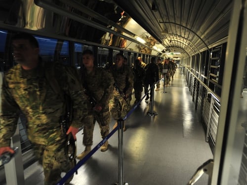 Soldiers from 2nd Battalion, 12th Infantry Regiment, out of Fort Carson, Colorado, arrive at Ramstein Air Base in Germany on May 15 as part of an emergency deployment readiness exercise. (Sgt. 1st Class Jacob A. McDonald/Army)