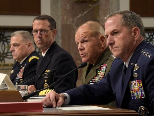 The U.S. military service chiefs, from left, Army Chief of Staff Gen. Mark Milley, Chief of Naval Operations Adm. John Richardson, Marine Corps Commandant Gen. Robert B. Neller and Air Force Chief of Staff Gen. David Goldfein, are shown last year. In recent days they have all publicly denounced racism and extremism after a white supremacist rally in Virginia. (Susan Walsh/AP)