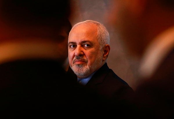 Iranian Foreign Minister Mohammad Javad Zarif attends a March 10 press conference with his Iraqi counterpart Mohamed Alhakim at the Ministry of Foreign Affairs building in Baghdad, Iraq. (Hadi Mizban/AP)