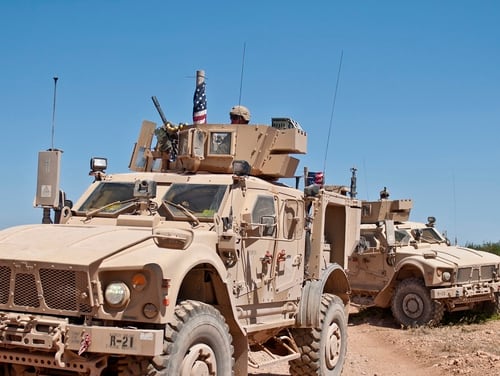 U.S. military vehicles provide security during their independent, coordinated patrol outside Manbij, Syria, July 16, 2018. (Staff Sgt. Timothy R. Koster/Army)