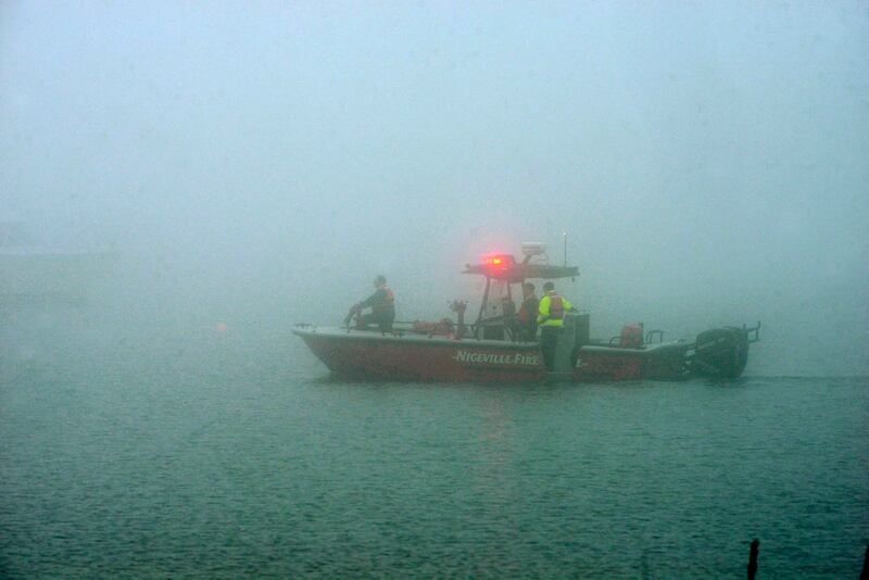 Bad Weather Keeps Helicopter Wreckage 25 Feet Under Water