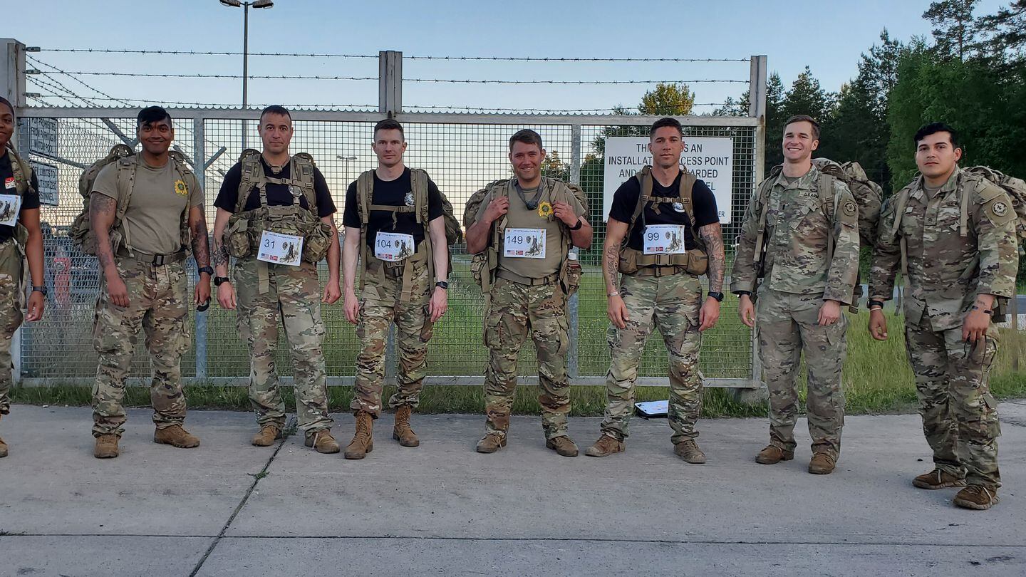 Master Sgt. Justin Bolin, third from right, joins seven of his colleagues from the 2nd Cavalry Regiment in an undated photo. (Courtesy of Justin Bolin)