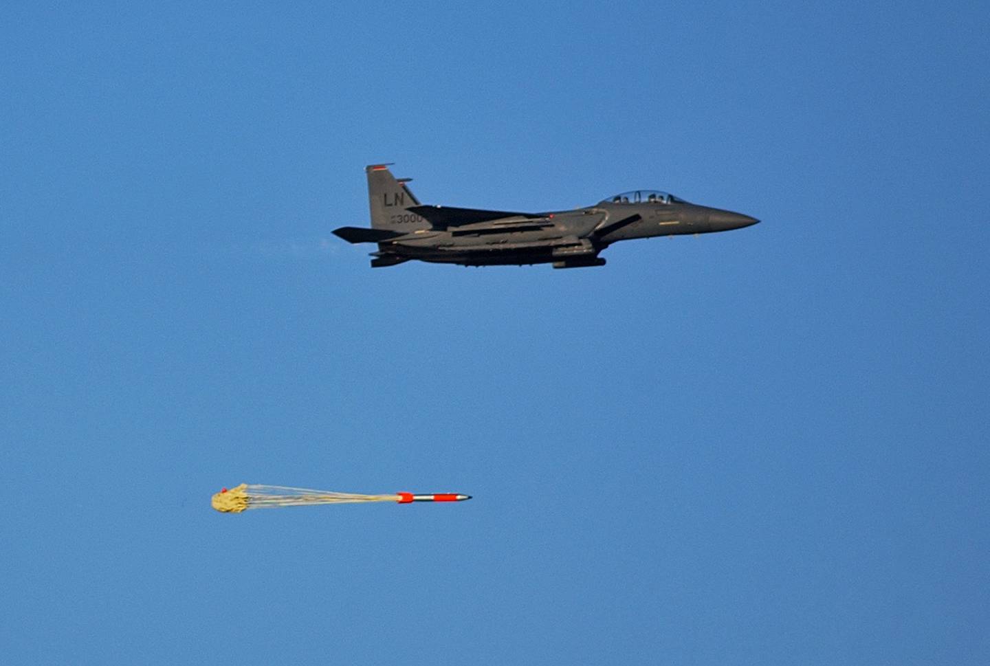In this undated photo, a joint test assembly undergoes a flight test at Sandia National Laboratories’ Tonopah Test Range in Nevada. The Air Force Nuclear Weapons Center received formal approval in late October 2018 to enter the production phase for the B61-12 nuclear gravity bomb’s new guided tail-kit assembly, or TKA. The Air Force is responsible for the B61-12 TKA, joint integration of the bomb assembly and TKA into the “all-up-round” of the weapon, and its integration with aircraft. (Air Force)