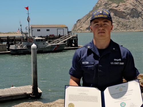 U.S. Coast Guard Boatswain’s Mate 3rd Class Gerrod J. Britton received the service's Commendation Medal last month for saving three people after a car crash last summer. (Facebook/Coast Guard)