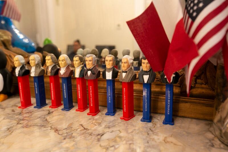 Presidential Pez candy dispensers sit on fireplace mantel at the U.S. Digital Service office, located in an old townhouse on Jackson Place across from the White House in Washington, D.C. (Alan Lessig/Staff)