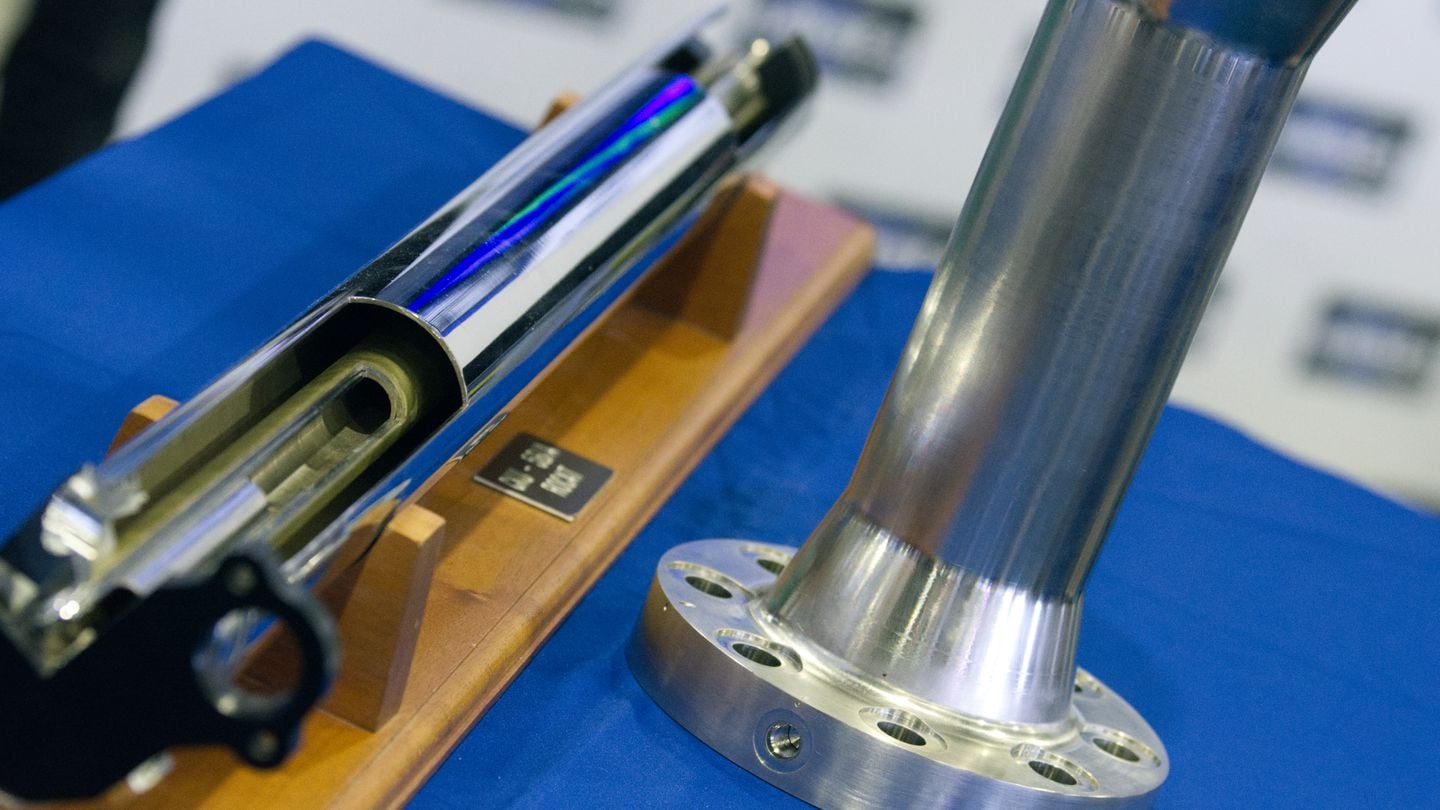 Parts made by additive manufacturing are displayed at a U.S. Navy booth at the Sea-Air-Space conference in Maryland on April 9, 2024. (Colin Demarest/C4ISRNET)