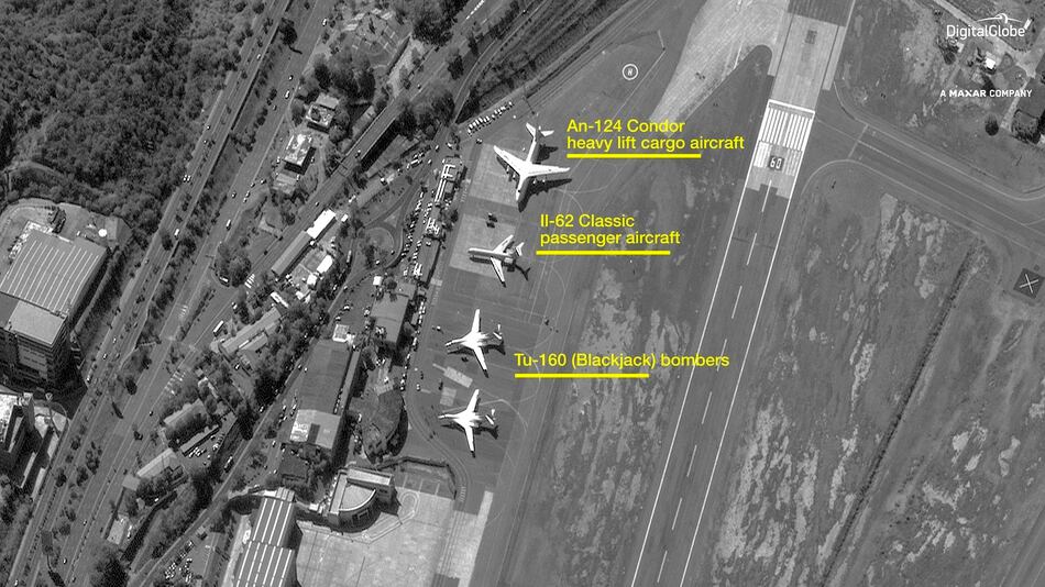 Satellite photos provided by DigitalGlobe show two Russian nuclear-capable Tu-160 Blackjack bombers along with a heavy-lift AN-124 cargo plane and an Il-62 passenger plane outside of Venezuela's capital on Dec. 10, 2018. (DigitalGlobe)