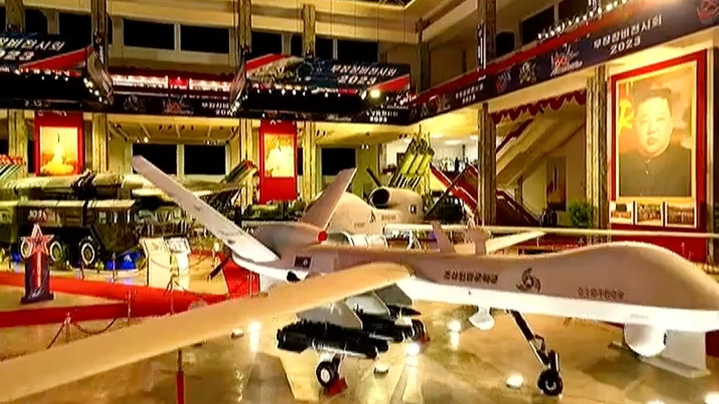 North Korean drones striking similar to the MQ-9 Reaper and RQ-4 Global Hawk are seen during a weapons exhibit publicized by state media. (Photo provided/KCTV/Screenshot)