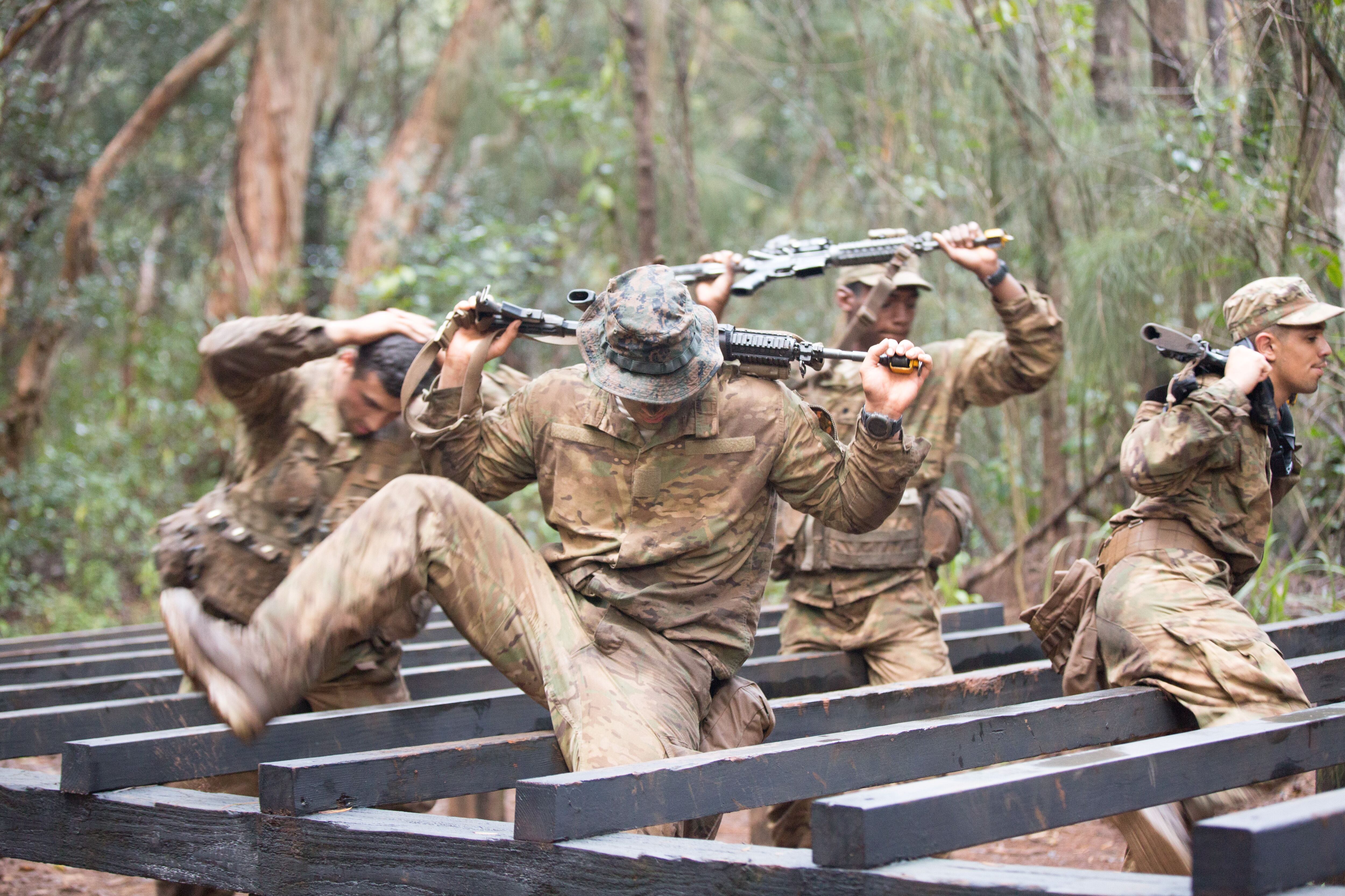 Soldiers wear new tropical uniforms and boots in jungle ACU field test