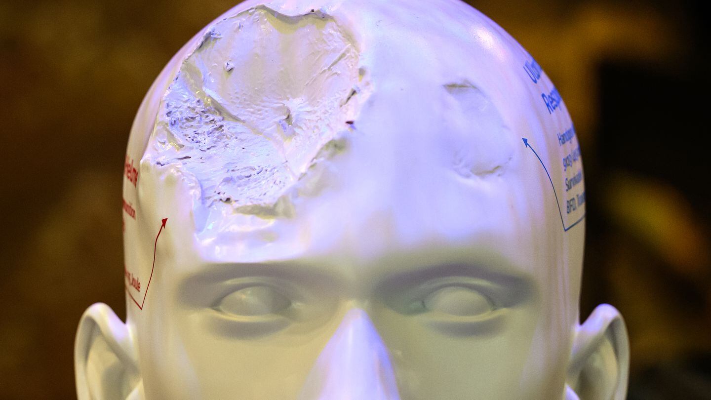 Mannequin heads at the DSEI fair showed a variety of ballistic head wounds at the Ulbrichts Protection stand on Sept. 12, 2023. (Leon Neal/Getty Images)