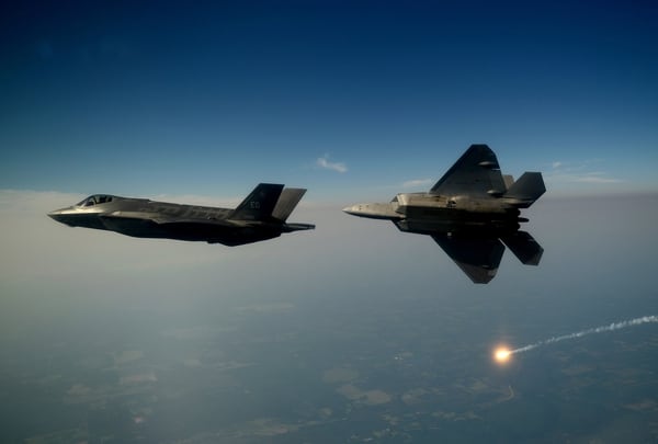 An F-35A and an F-22A Raptor fly together for the first time in 2012. (Master Sgt. Jeremy Lock/U.S. Air Force)