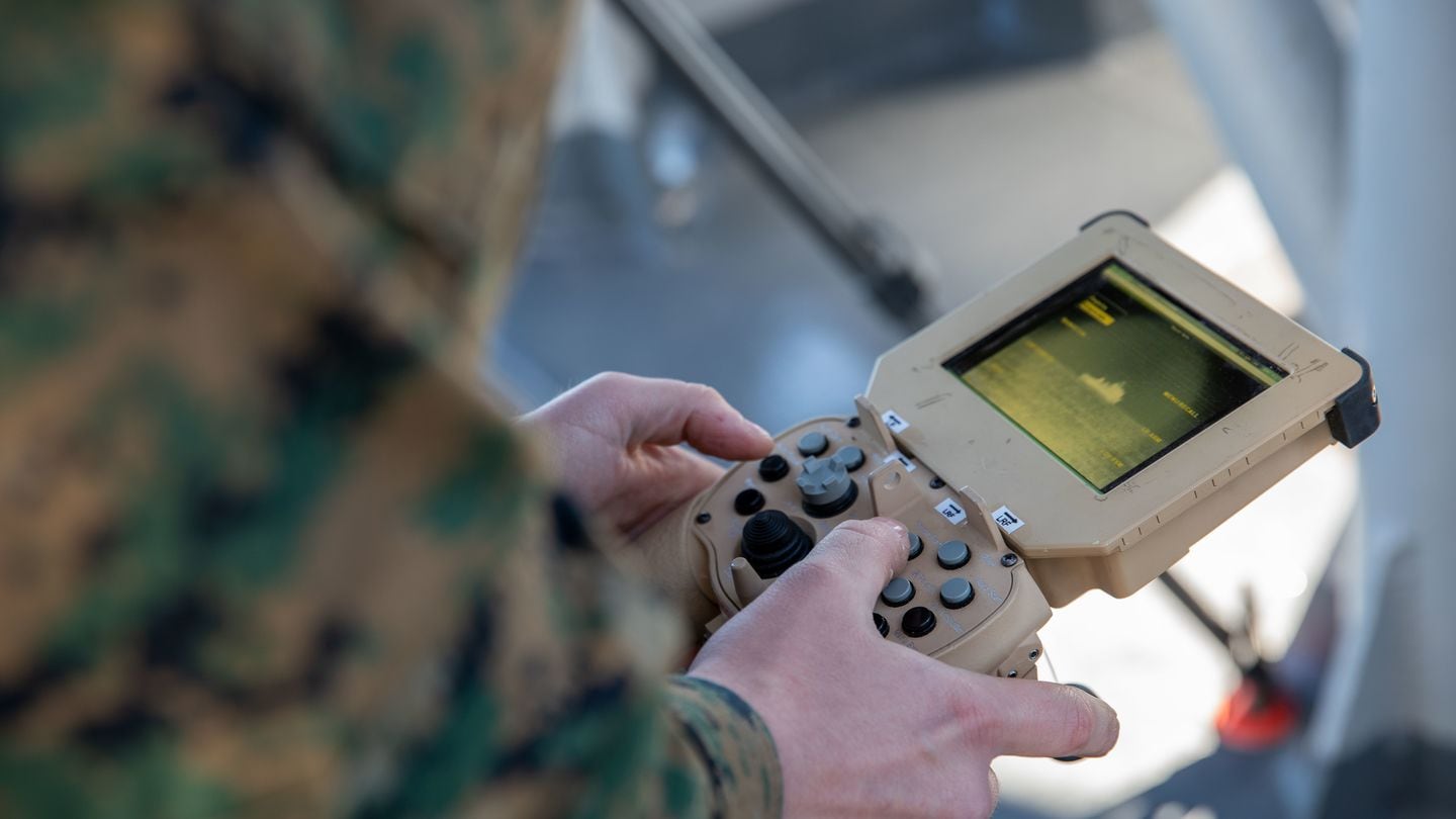 U.S. Marine Corps Cpl. Nathan Decker tracks a simulated target using a Ground-Based Operational Surveillance System aboard the Wasp-class amphibious assault ship Bataan on Jan. 27, 2023. (Gunnery Sgt. Jeffrey Cordero/U.S. Marine Corps)