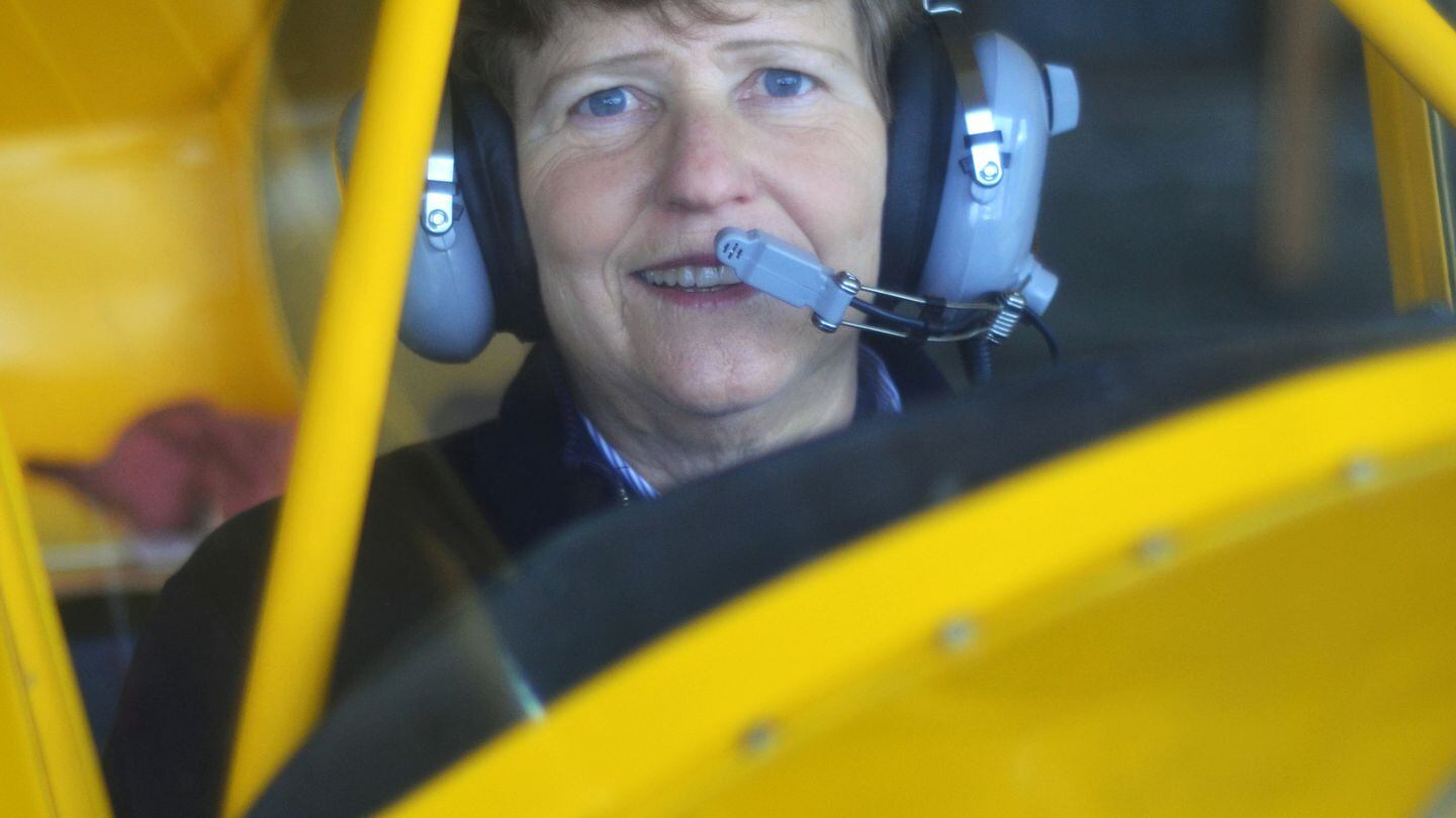 Author Eileen Bjorkman in the cockpit of a J-3 Cub. Bjorkman is a writer, pilot, aeronautical engineer, and retired Air Force colonel. (Photo courtesy of Ruby James)
