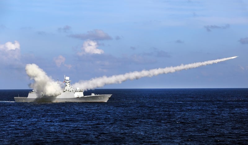 The Chinese missile frigate Yuncheng launches an anti-ship missile during an exercise near China's Hainan Island and Paracel Islands in July 2016. (Zha Chunming/Xinhua via AP)