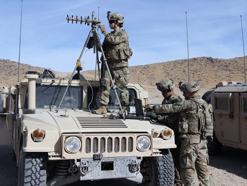 Specialists from the Expeditionary Cyber Support Detachment, 782nd Military Intelligence Battalion (Cyber), test offensive cyber and electromagnetic operations as part of a tactical pilot. (Steven Stover/Army)