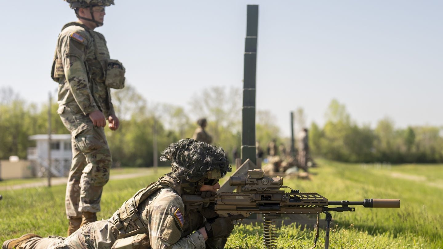 A 101st Airborne Division Soldier fires the XM250 Automatic Rifle during a Next Generation Squad Weapons New Equipment Training event at Fort Campbell, Ky. on April 15, 2024.  (Jason Amadi/Army)