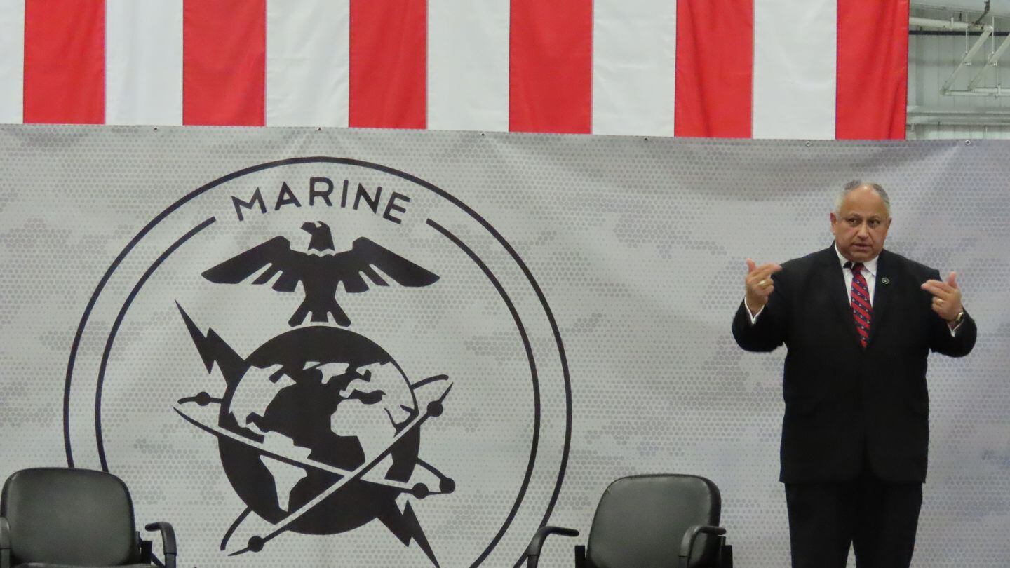 Navy Secretary Carlos Del Toro addresses the audience at a Defense Innovation Roundtable and unit activation celebration for the Marine Innovation Unit on May 5, 2023, at Stewart Air National Guard Base in New York. (Staff/Megan Eckstein)