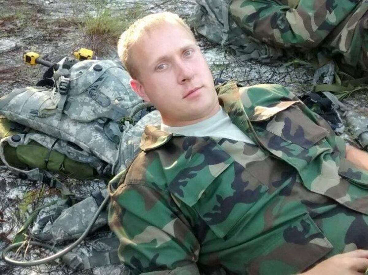 soldier bound and shot to death police
