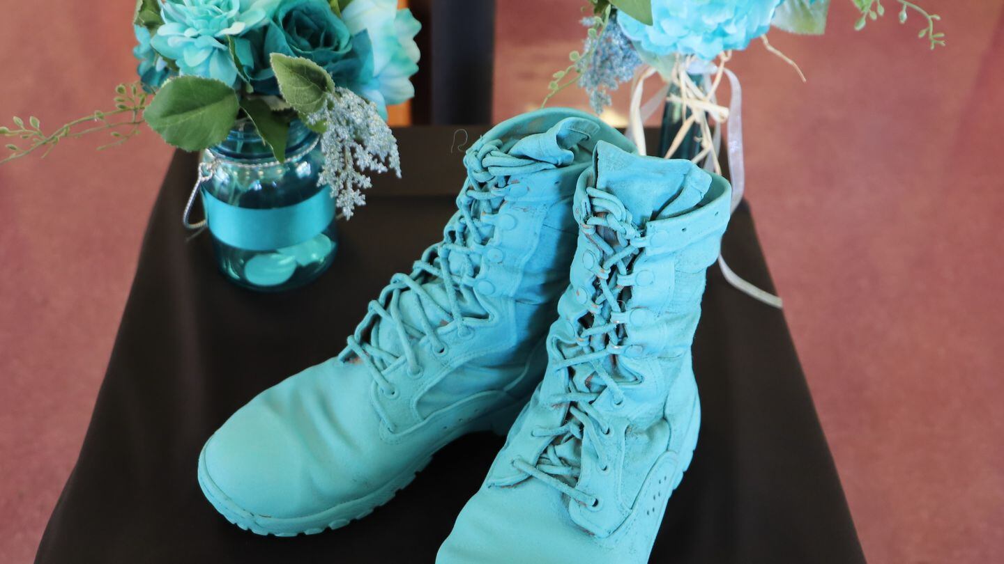 Teal shoes on display at McMahon Auditorium April 22, 2021, painted teal and displayed to bring awareness to Sexual Assault Awareness Prevention. (Sgt. James Geelen/Army)