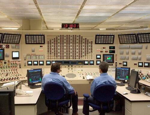 Employees work in the control room at Browns Ferry Nuclear Plant in Athens, Ala., on June 21, 2007. The plant was the largest in the world when it was first opened in 1974 by the Tennessee Valley Authority. (Saul Loeb/AFP via Getty Images)