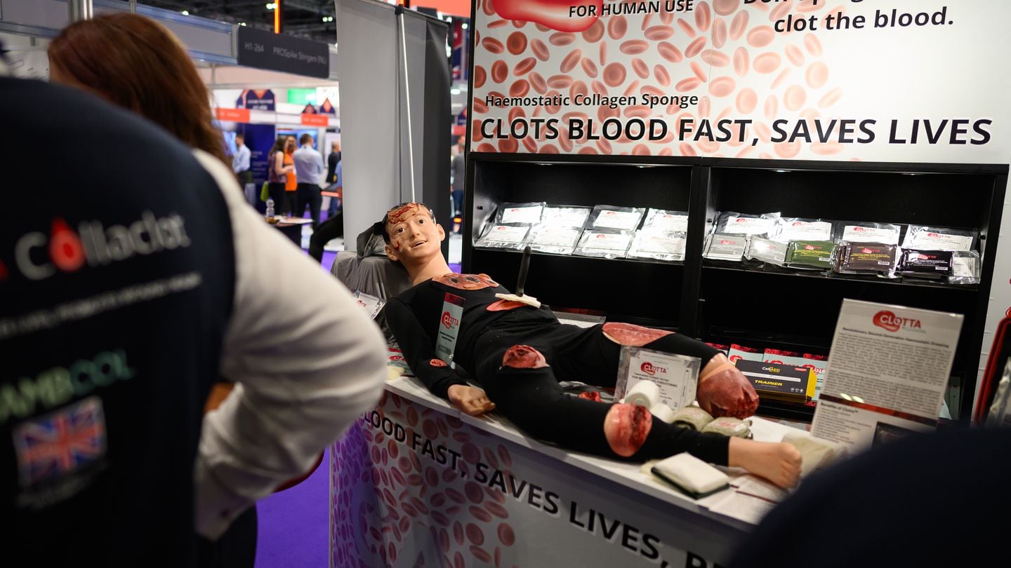 A smiling mannequin is seen on the Clotta haemostatic collagen sponge display stand on Sept. 12, 2023, at the DSEI conference in London, England. (Leon Neal/Getty Images)