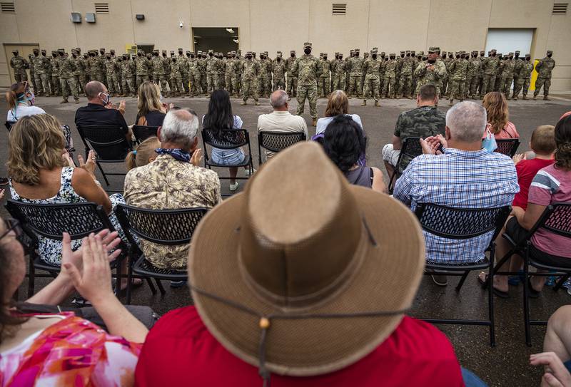 Col. Brian Pfarr, far right, addresses the approximately 150 soldiers from the Stillwater-based 34th Military Police Company who will deploy to Naval Station Guantanamo Bay in support of Joint Task Force Guantanamo to provide base security Sunday, Aug. 9, 2020.