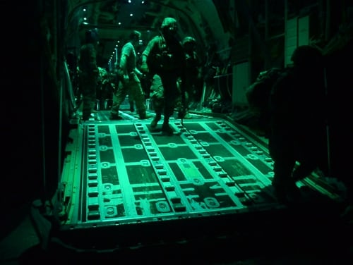 Soldiers, assigned to the East Africa Response Force (EARF), 101st Airborne Division, exit a C-130J Super Hercules, assigned to the 75th Expeditionary Airlift Squadron, at Manda Bay Airfield, Kenya, on Jan. 5, 2020. (Senior Airman Sean Carnes/Air Force)