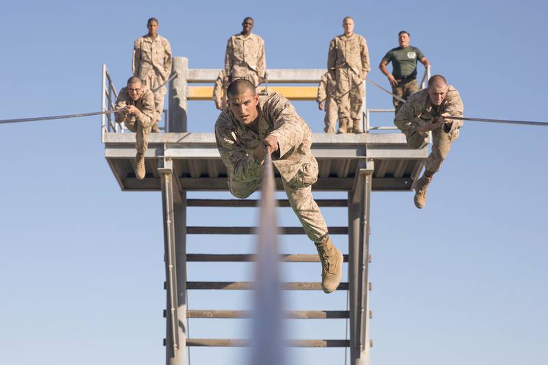 Rct. Eliseo Z. Sandoval overcomes an obstacle during the Confidence Course at Marine Corps Recruit Depot, San Diego, Dec. 2, 2020.