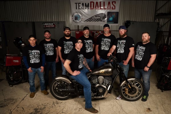 Veterans representing Team Dallas participate in a bike 